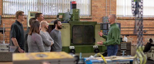 Team of Engineers learning about the manufacturing process