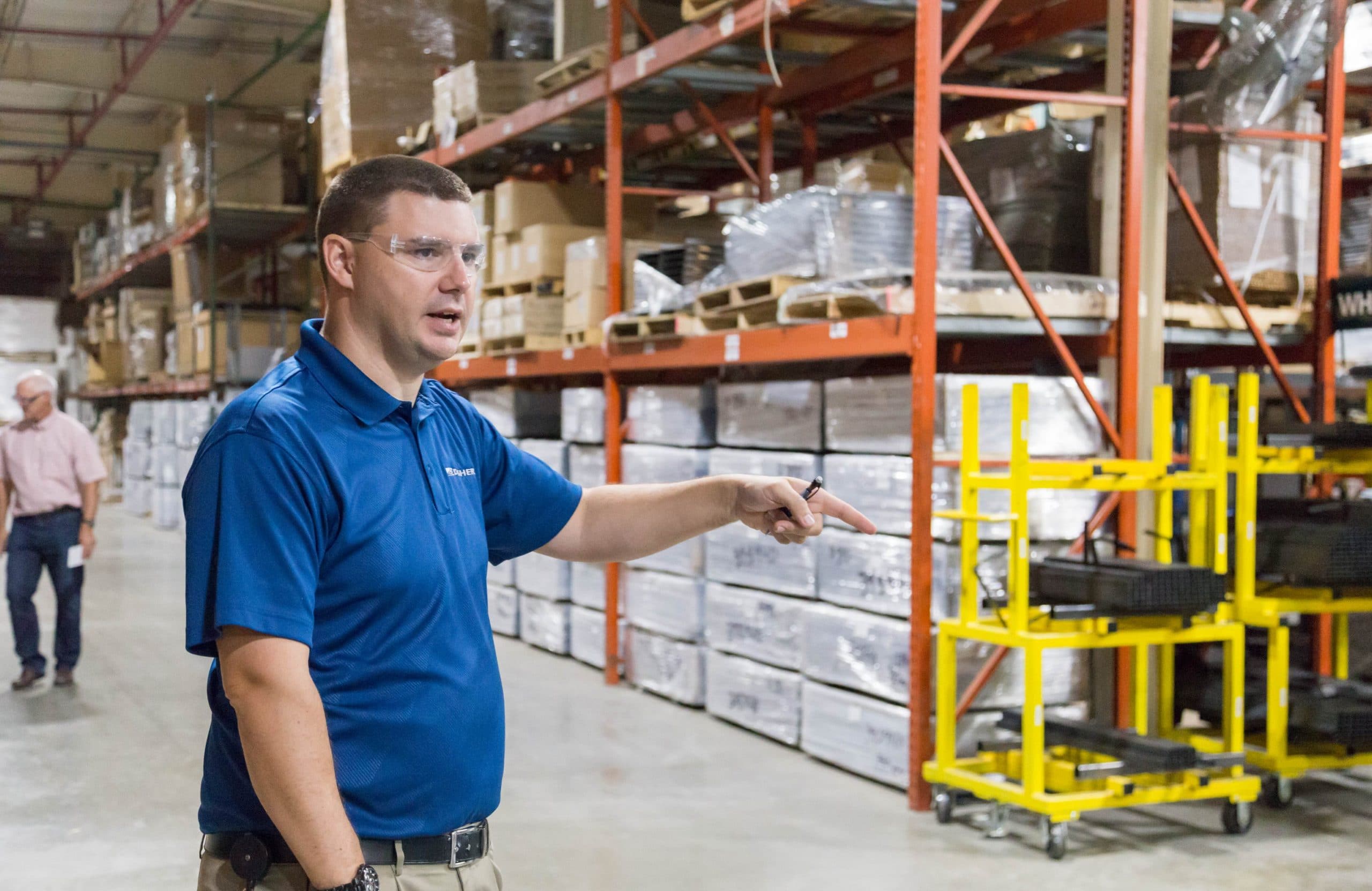 Man pointing in a manufacturing space