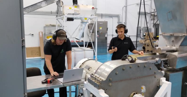 Two engineers working on GTF's Milling System