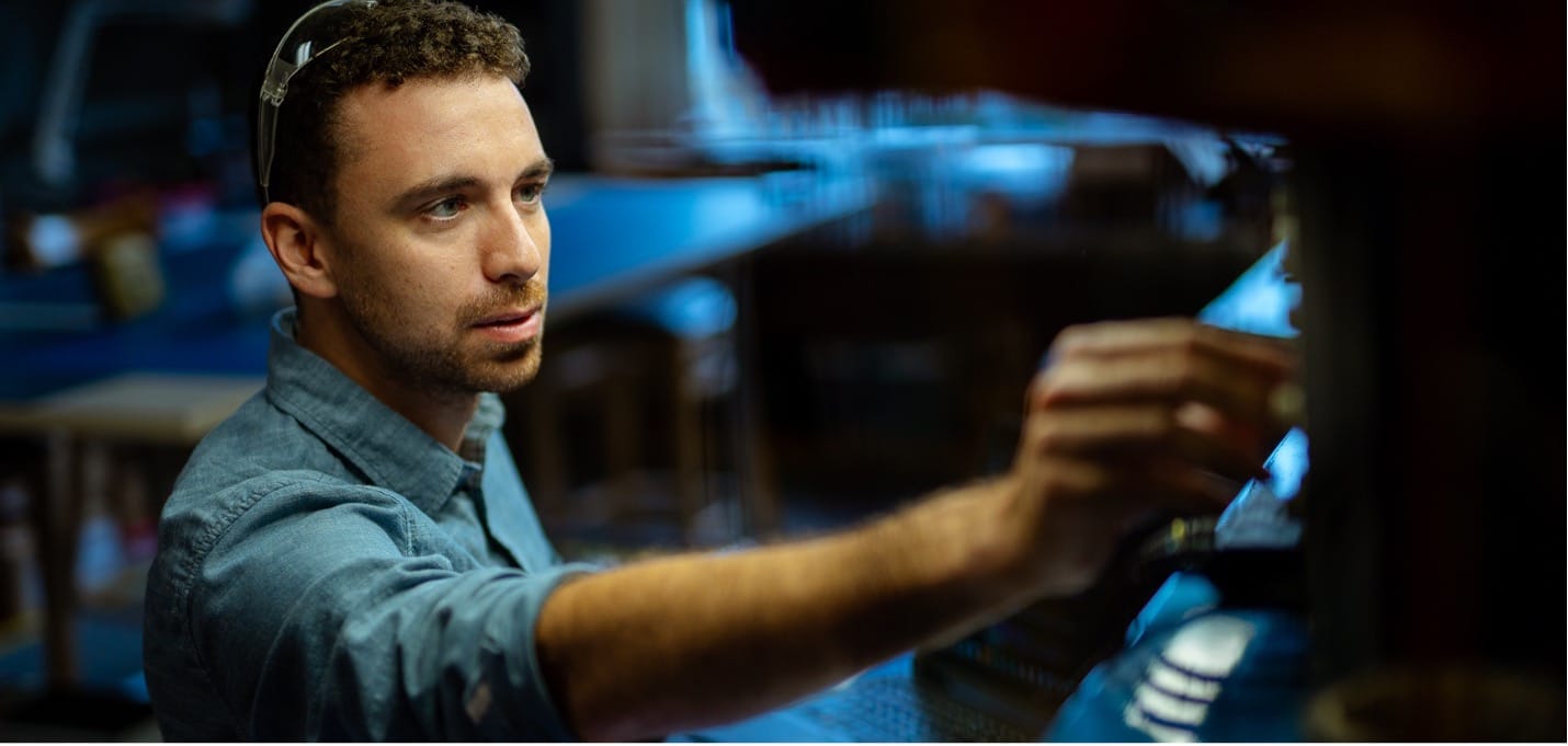 Engineer working in electronics lab